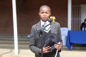 Tankiso Mohola from Moorosi High School reciting a poem on the danger of Human trafficking